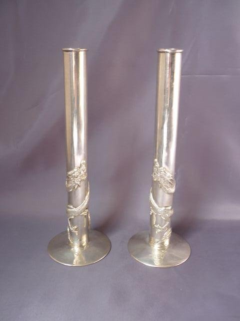 Pair of 19th Century Chinese Silver (900) Posy Vase: of elongated cylindrical form, decorated with applied rampant dragons, the whole on a circular foot, impressed markers marks, h 18.5cm