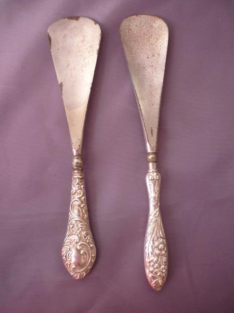 Pair of Edwardian Sterling Silver Shoe Horns,: hallmarked, Birmingham,1901,1905,embossed with flowers and scrolls, (2)