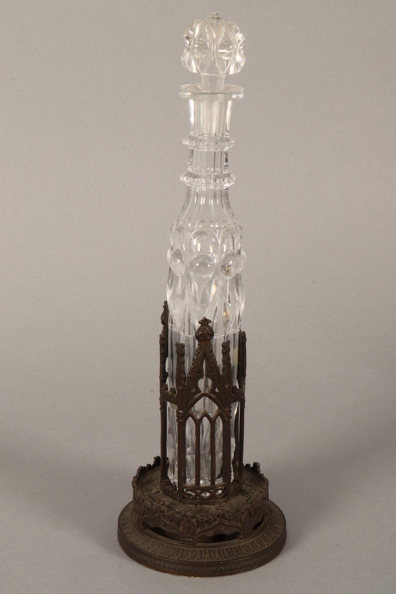 Victorian Gothic Revival Scent Bottle Holder,: in the form of repeating pierced gothic arch windows, set above a circular pedestal base, with clear glass bottle and stopper, total height 33.5cm