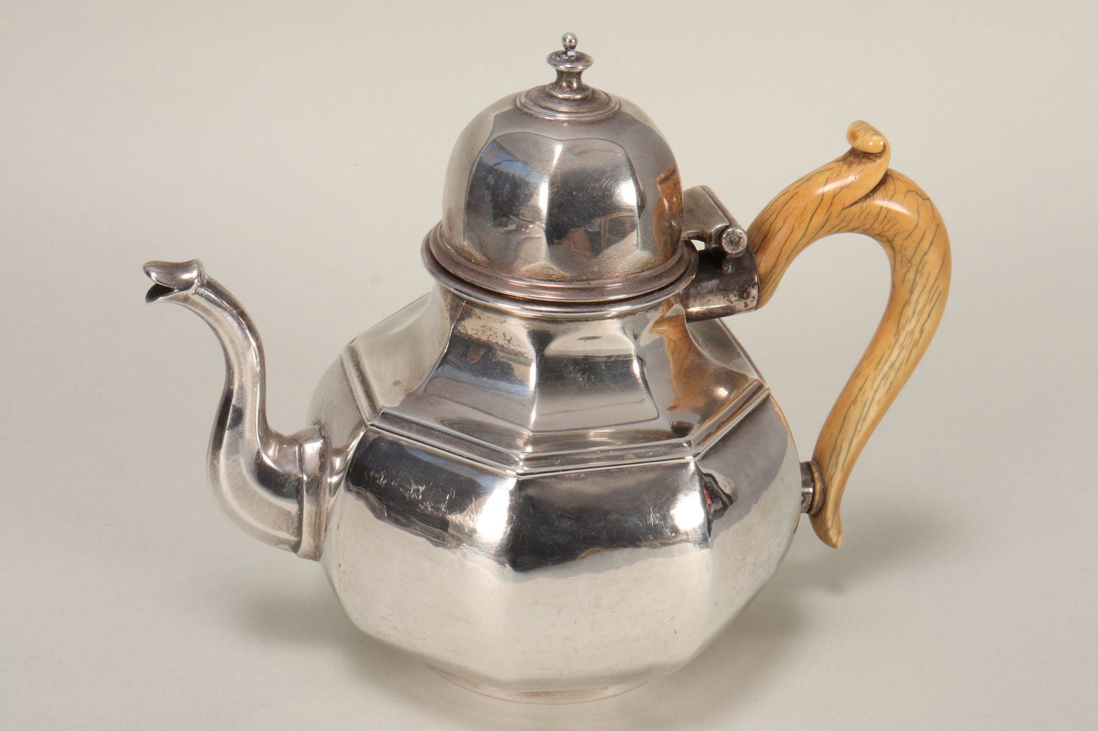 Victorian Sterling Silver Teapot,: hallmarked London, 1862, G.F (George Fox - part of the well known Fox family silversmiths), with finial above a facetted domed cover, above a wonderful facetted baluster body, set with handle, total w