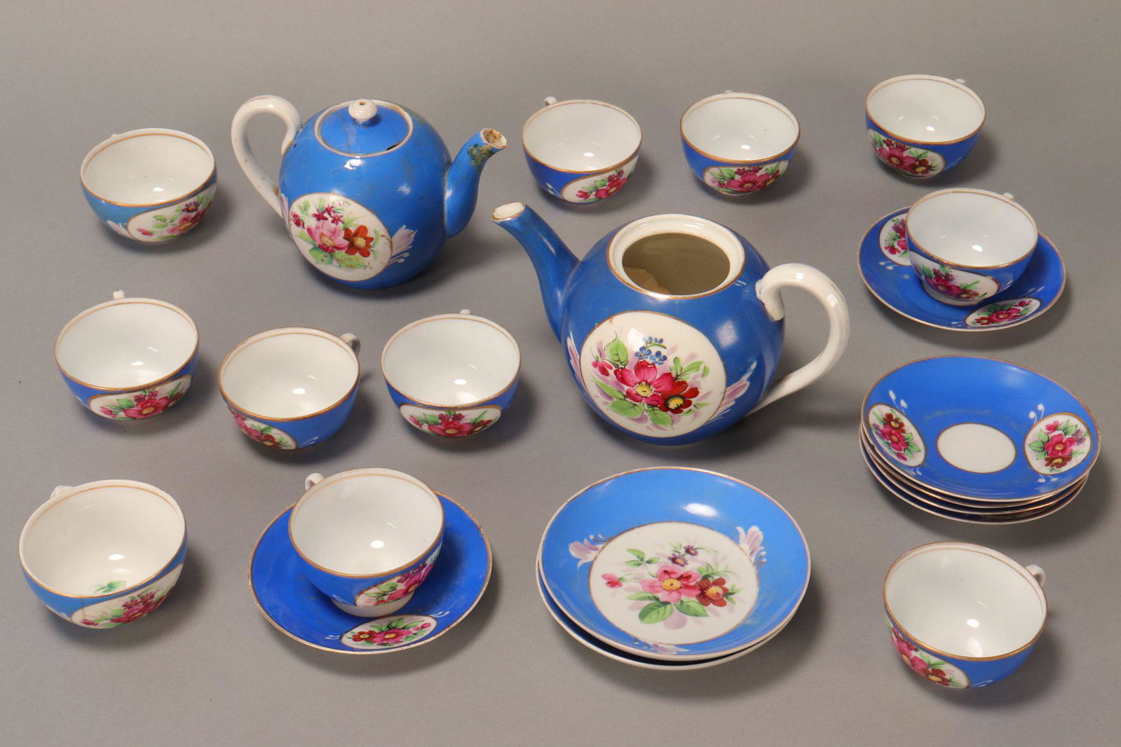 19th Century Russian Porcelain Part Tea Set,: by Gardner factory, comprising nine cups, six saucers, two teapots and two matched Gardner cups and saucers (19)