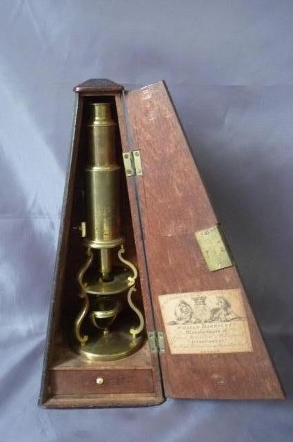 Early 19th Century William Harris & Co Microscope: and Box, c.1820, in brass, ivory and mahogany, with original paper label to the door, h 32cm