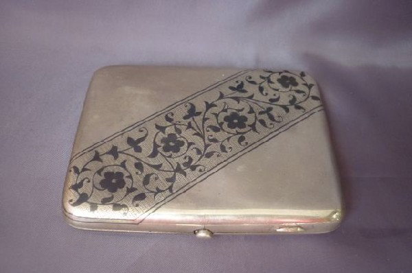 Estonian Niello and Silver Cigarette Case,: decorated with a vine and floral motif