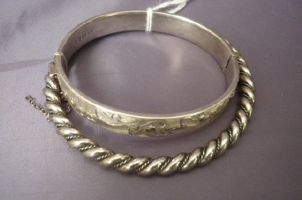 Edwardian Sterling Silver Bangle,: hallmarked, London, 1904, together with a silver twist bangle, (2)