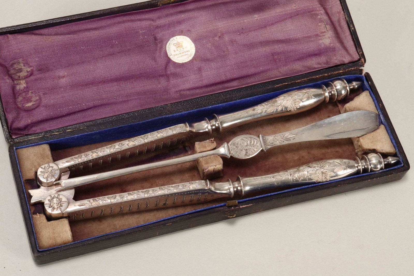 Australian Colonial Silver Crayfish Set,: hallmarked, c.1875, the box marked 'Brush and Drummond Goldsmiths & Jewellers, 29 Collins St. West, Melbourne,' with engraved floral decoration (2) Provenance: The Edward Clark Collection, Melbourne