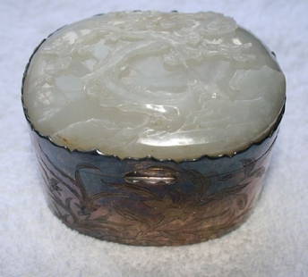 Chinese White Jade Mounted Silver Box and Cover,: the hinged lid enclosing silver gilt interior and inset mirror, l 10cm