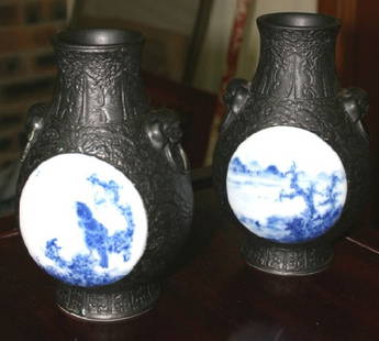 Unusual Pair of Chinese Porcelain Vases,: with inset blue and white panels on an ebonised ground