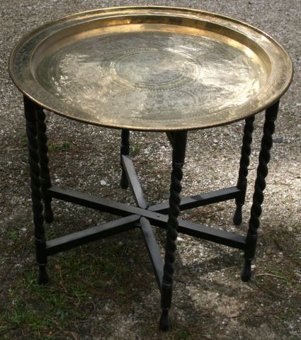 Brass Topped Side Table, c.1950: with engraved circular metal tray resting on turned supports and united by ankle stretchers d 84cm, h 57cm