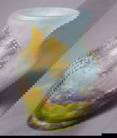 Daum Nancy Miniature Cameo Glass Vase,: beautiful cut with a continuous frieze of trees and mountains in a enamel fish in naturalistic tones of a mottled blue ground, signed verso, a/f, h 7cm