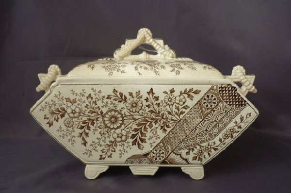 Old Hall Tureen and Cover designed by Christopher: Dresser, c.1880, decorated in Aesthetic Movement taste , 21cm x 33cm