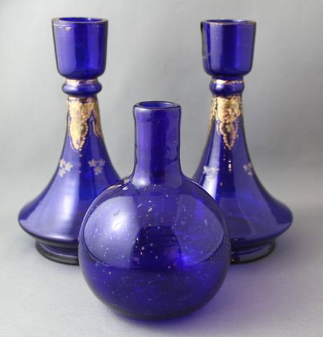 Pair of Edwardian Blue Glass Vases,: of tapering form, enameled and gilt with decoration to the neck, together with Georgian blue glass bottle, (3)