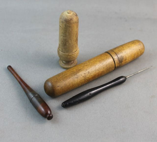 Three 19th Century Wooden Treen Needle Cases,: one containing a crochet hook, (3)