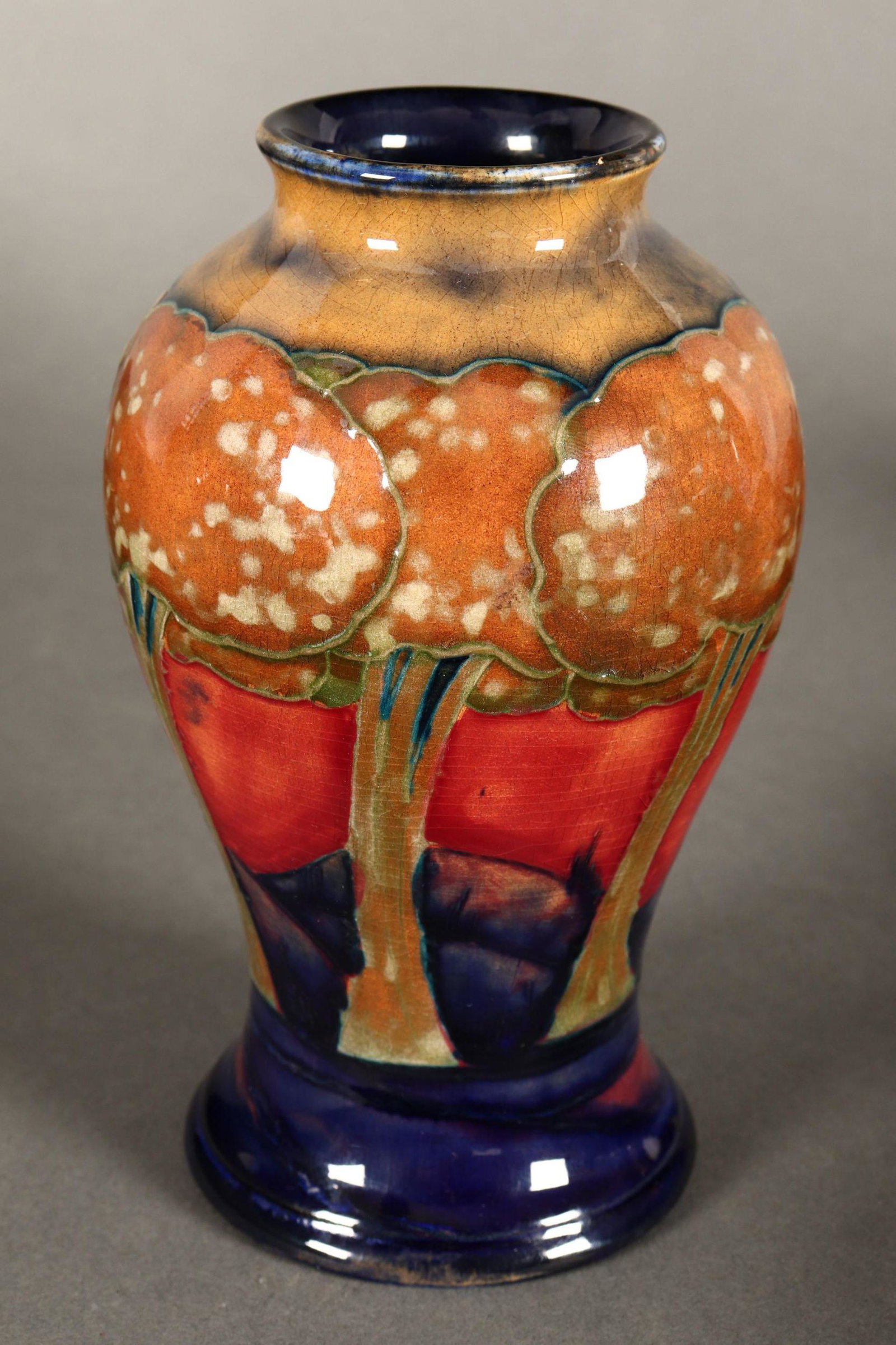 William Moorcroft 'Eventide' Pattern Vase,: c.1925, of classic baluster form tapering to a slightly everted rim, signed and with impressed marks 'Moorcroft' and 'Made in England', height 16cm