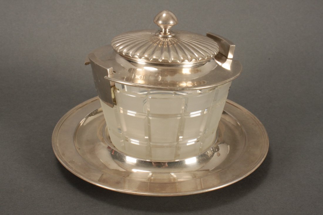 Early 20th Century Russian 84 Silver Sweets Dish,: marked 84 Zolotnik, St Petersburg, maker Mikail Grachev, the crystal half barrel form dish set with protruding silver handle finials and set with a domed and ribbed cover, set above a circular silver