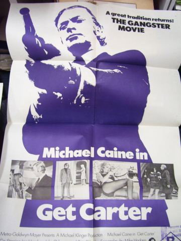 Get Carter: An fabulous original pop poster for Michael Caine’s film Get Carter, approx 100 x 68 cm, in great condition; t/w an original poster for Paul Newman in The Moving Target, 70 x 32 cm in good order. Bo