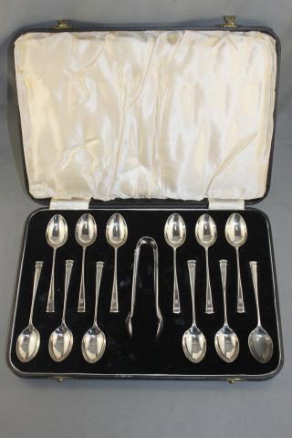 Boxed Set of Twelve Edwardian Sterling Silver: Teaspoons and sugar tongs, hallmarked, Sheffield, 1937, (13)