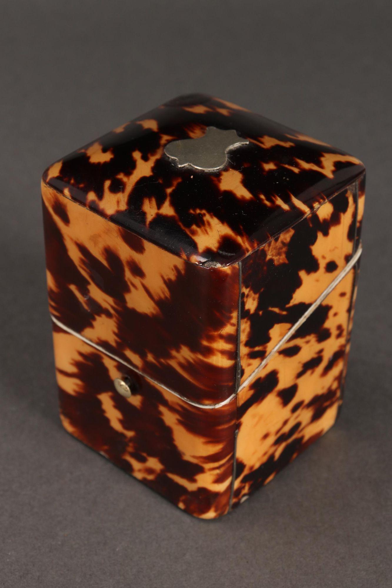 Tortoiseshell Playing Card Box,: of petit rectangular form, with a hinged cover set with a plain silver shield, opening to reveal a set of playing cards, 7.5cm x 5.5cm x 5.5cm