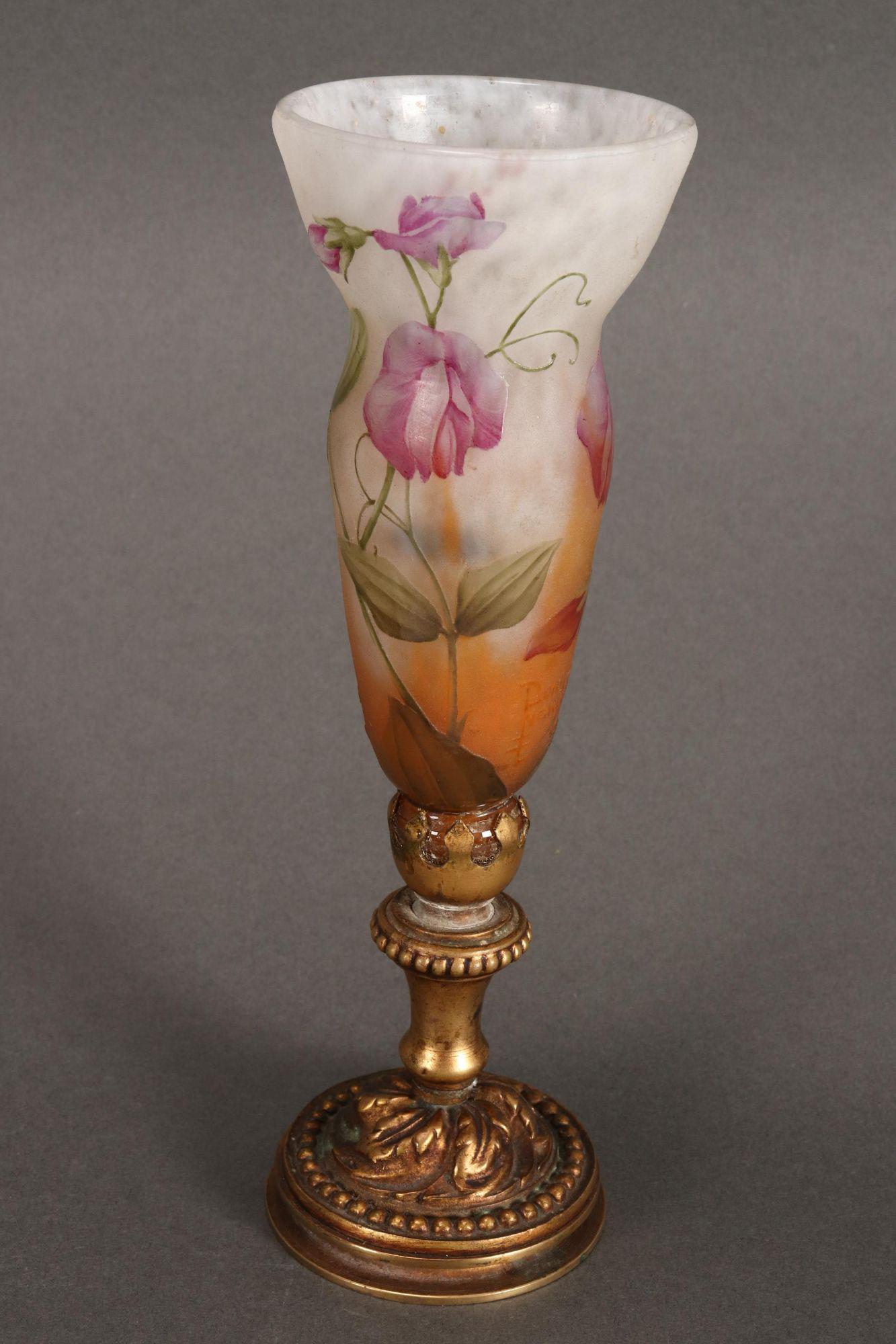 Daum Nancy 'Sweet Pea' Cameo Glass Pedestal: Vase, of tulip form, decorated with sweet pea blossoms and foliage, in delicate tones of pink and green on an orange and white ground, signed, raised on a gilt metal stand, height 20.5cm