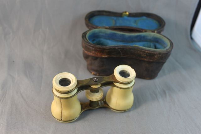 Pair of French Ivory Opera Glasses,: in leather case,