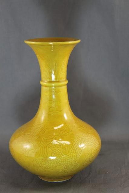 Chinese Yellow Glazed Vase,: with spreading lip above squat baluster body with incised dragon motifs, six character mark to base, h 16cm