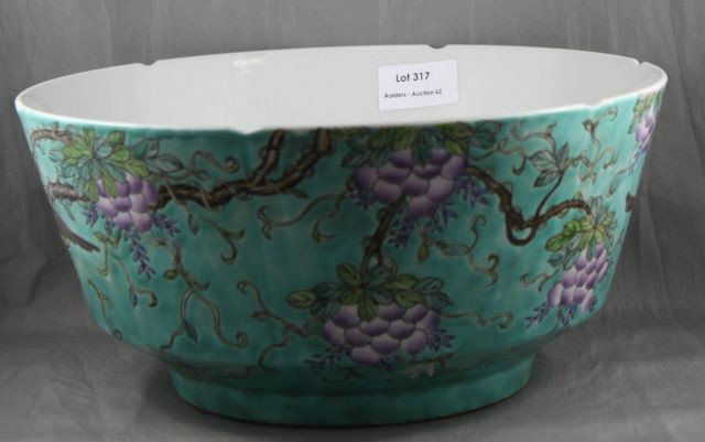 Good Chinese Deep Porcelain Bowl,: decorated with a frieze of birds perched amongst flowering branches, in tones of purple, brown and turoise, d 27cm