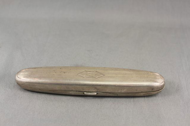 American Sterling Silver Cigar Case,: with engine turned motifs,