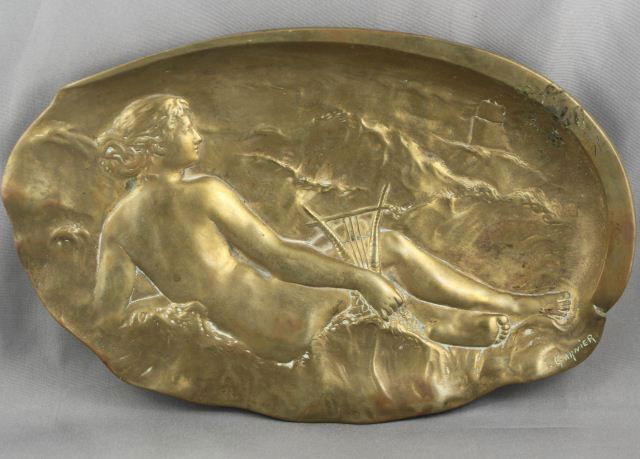 Fine French Art Nouveau Bronze Gilt Plaque,: of oval form, decorated with a raised image of a muse with lyre, signed, J Garnier, 25 x 16 cm