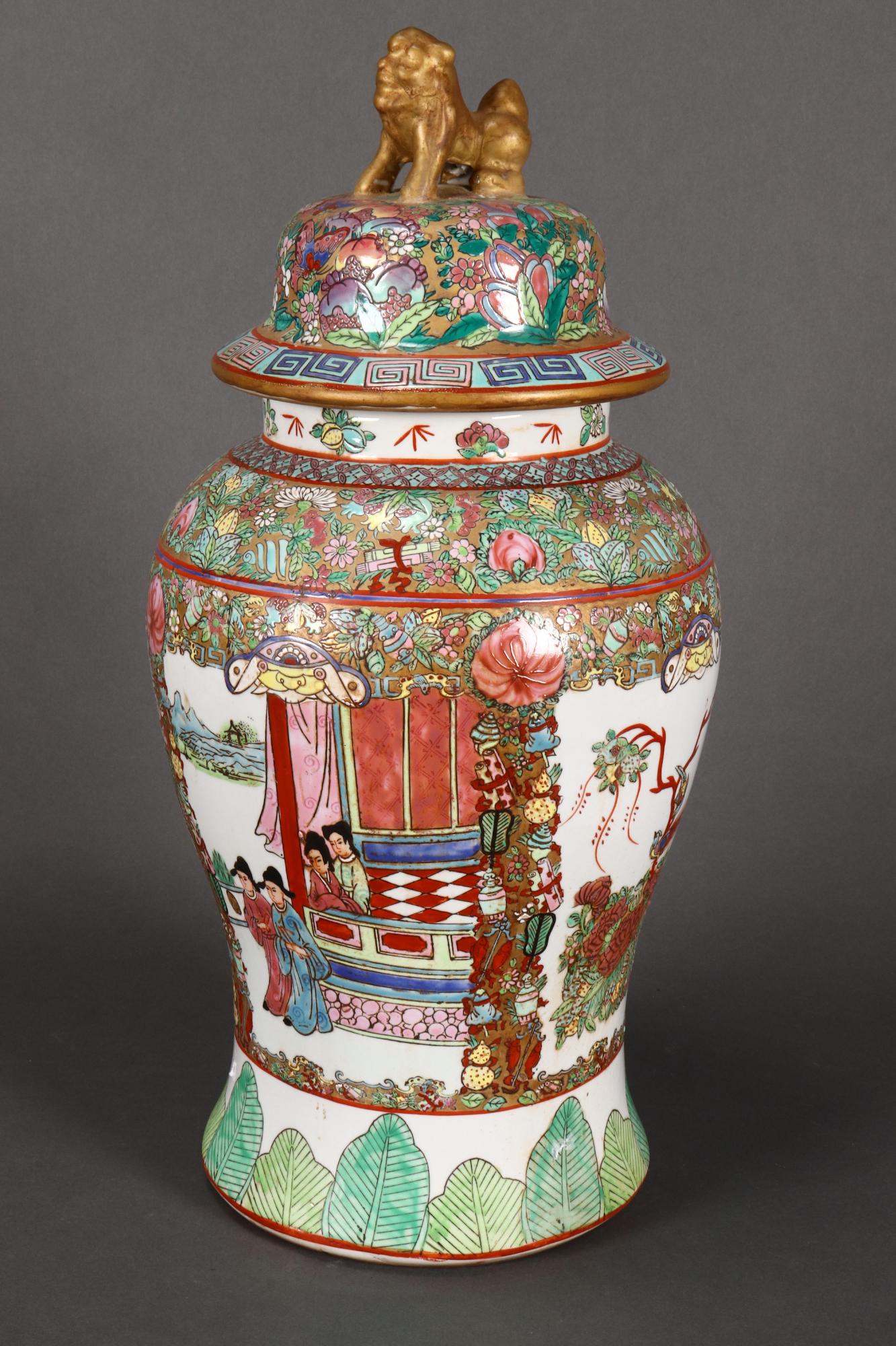 Cantonese Porcelain Jar and Cover,: of baluster form with a short cylindrical neck, the cover set with fo dog finial, decorated with court scenes, phoenix, flowers and buddhist motifs, height 49cm