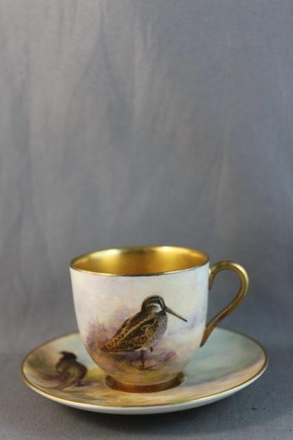 Royal Worcester Porcelain Demi Tasse and: Saucer, the saucer painted with a pheasant and the demi tasse with Snipe, both signed Maybury, (2)