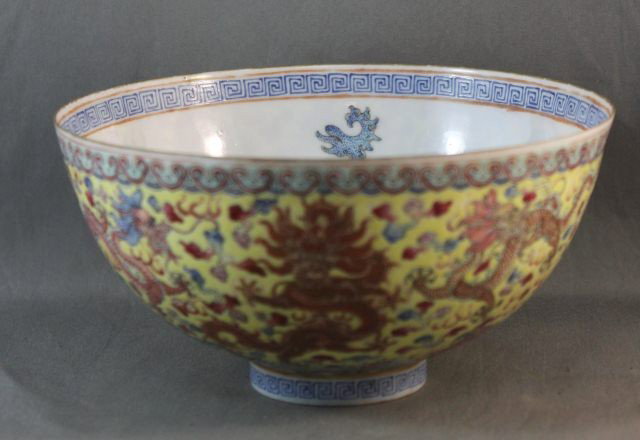 Chinese Eggshell Porcelain Bowl,: Qianlong Mark, internally decorated with phoenix's in flight , and the exterior painted with five toed dragons chasing the flaming pearl of immortality diameter 14cm Provenance Josef Neuman Collection