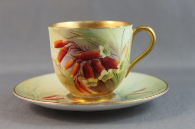 Royal Worcester Australian Flora Demi Tasse and: Saucer, painted with Christmas Bells, signed R.Austin (2)