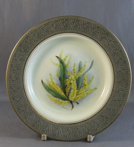 Royal Worcester Wildflower Dish,: painted with wattle, surrounded by a embossed olive boarder, signed Bradshaw, d 15cm