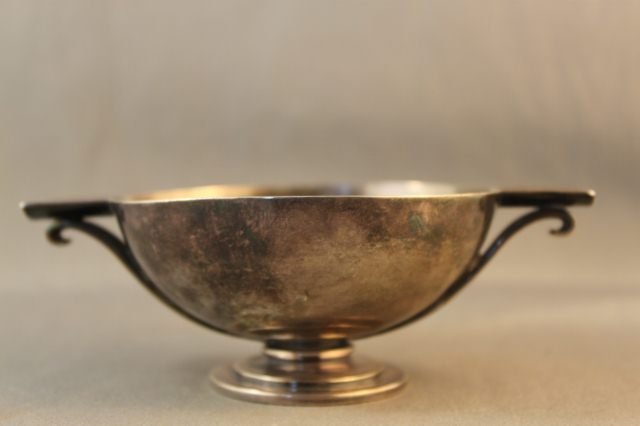 Georg Jensen Sterling Silver Footed Dish,: Harald Nielsen, c 1930, modelled with a deep tapered bowl, with scrolled supports on a disc foot , initialled HN d 12cm