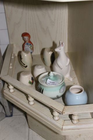 Merrick Boyd Earthenware Vase, c 1950,: together with a Boyd jam pot, two pairs of salt and pepper shakers , a bisque figure of a kangeroo and a figure of little red riding hood (8)