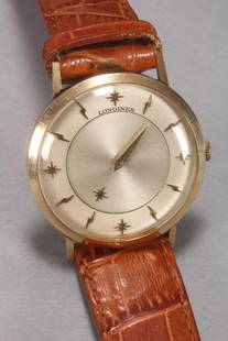 Longines 10ct Gold Filled 'Mystery Dial' Watch,: stamped '10k Gold Filled S&W' to case back, featuring a brushed silver sunburst dial set with alternating star and lightning bolt hour markers, the internal star denoting the hour hand marker, in a 10