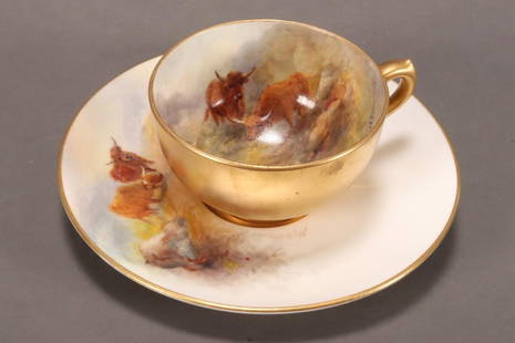 Royal Worcester Stinton Demi Tasse and Saucer,: both hand painted with two highland cattle in a mountainous landscape, signed H Stinton, with a gilt exterior, a/f (hairline to demi tasse), height of cup 3.4cm and diameter of saucer 10.5cm (2)