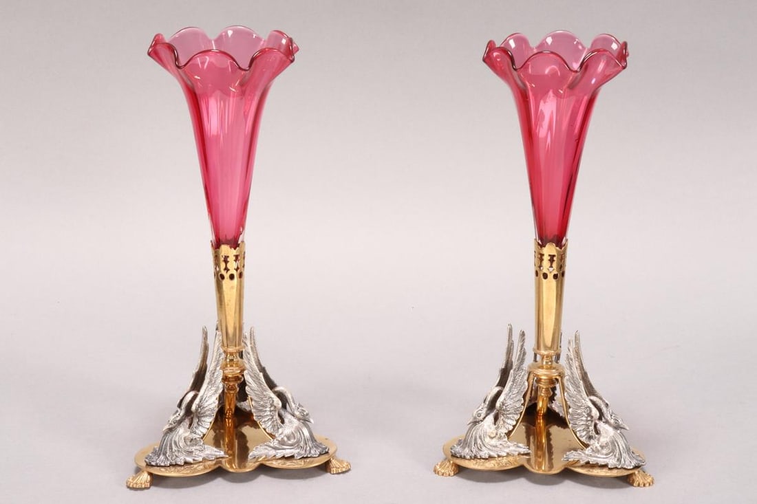 Pair of Cranberry Glass and Gold Plated Epergnes,: of tulip form, decorated with pierced pattern to body, set with three swans, standing on three shell feet, height 24cm (2)
