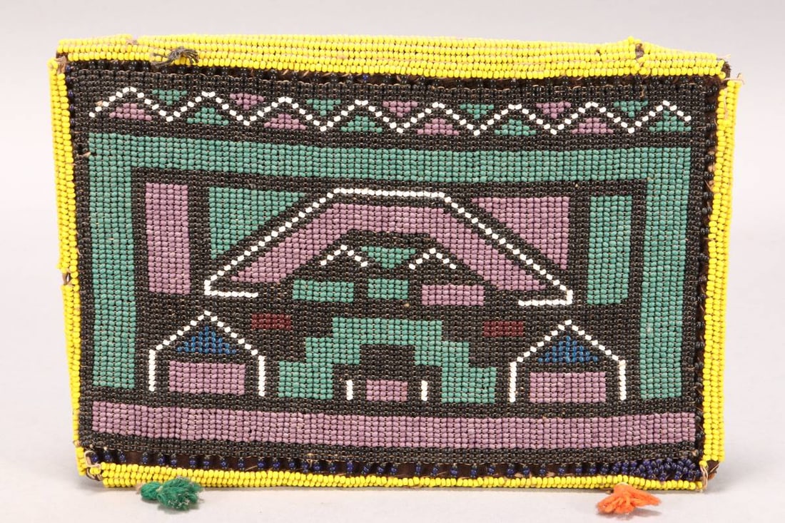 Ndebele People, Iphephetu (Maidens Apron),: South Africa, of rectangular form, with geometric house motif, in tones of purple, green, black and yellow, with masonite lining, 19cm x 28cm