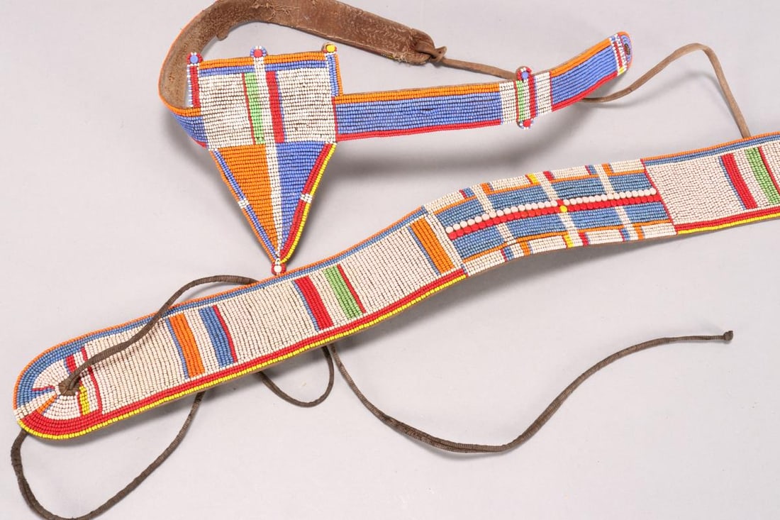 Two Maasai Beaded Belts, Kenya/Tanzania,: comprising women's belt, length 75cm, together with a beaded cache-sexe, length 68cm (2)