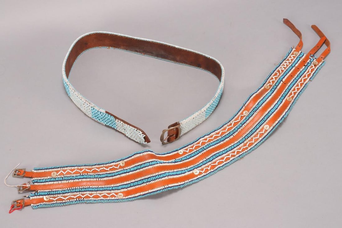 Two Xhosa People Beaded Belts, South Africa,: with leather, a/f, length 93cm and 97cm (2)