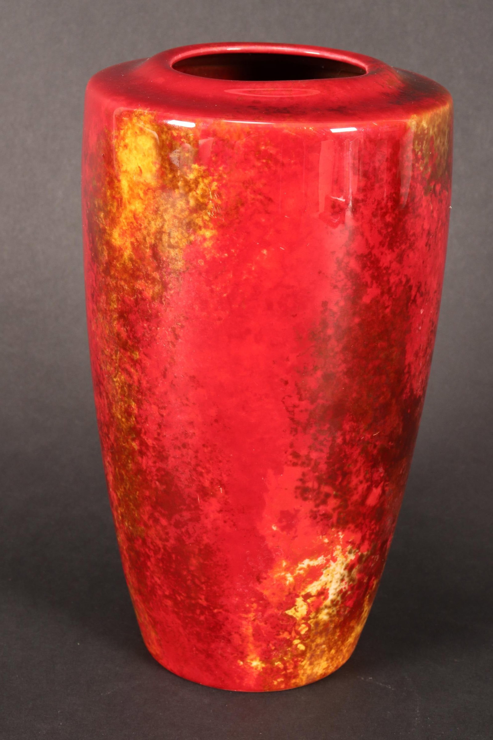 Royal Doulton Flambe Vase by Harry Nixon,: of ovoid form with a flattened rim, in mottled red, yellow and brown tones, signed HN to base, height 16.5cm