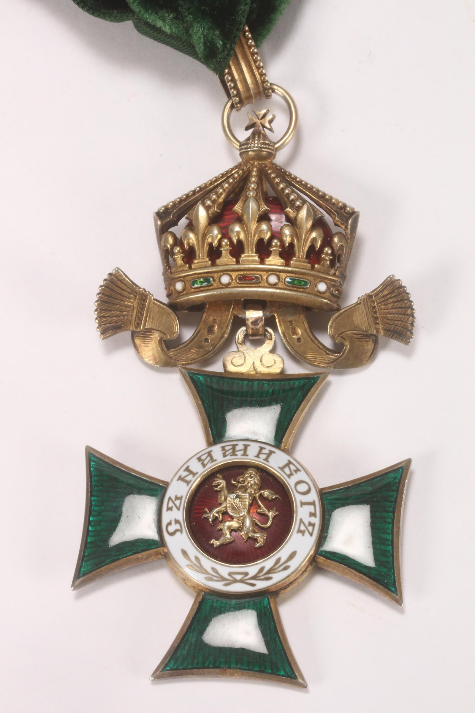 Bulgaria, Kingdom Order of St Alexander Class II Commander,: c.1910, in gilt silver and enamel, set with Imperial crown and cross, in red, white and green enamel, with green ribbon, length 9.5cm Note: The Order of St. Alexander was the second highest Bulgarian 