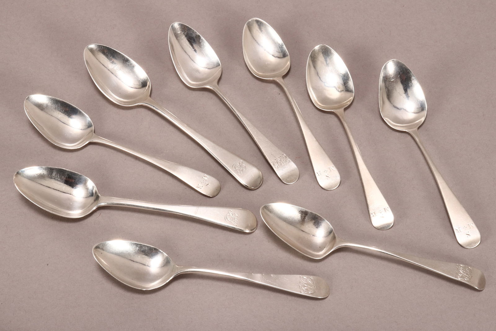 Matched Set of Nine Georgian Sterling Silver: Spoons, hallmarked London, 1822, SH//IB (Sarah & John William Blake), W.W (William Weston), London, 1815, WE//WF (William Eley I & William Fearn), WP (William Parker), all in old English pattern, tota