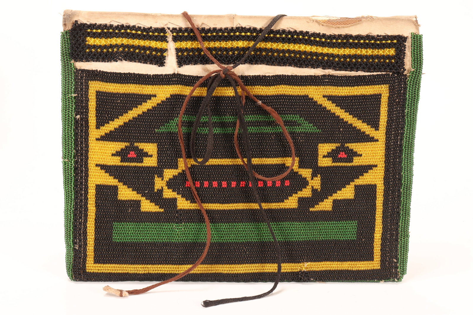 Ndebele People, Iphephetu (Maidens Apron), South Africa,: of rectangular form, with geometric motifs, a/f, with masonite lining, 28cm x 37cm Catalogue Note: The maidens apron shows that a young woman is of marriageable age. The imagerystitched onto Iphephetu