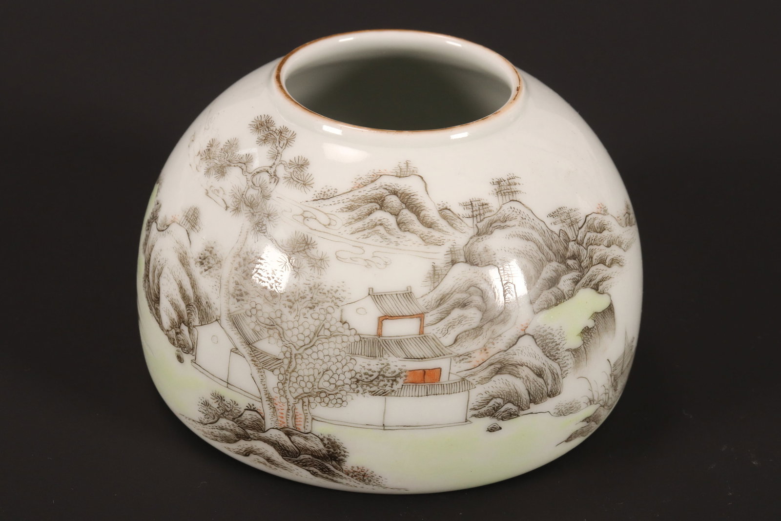 Chinese Republic Period Porcelain Brush Washer,: of domed form, decorated with a continuous landscape scene containing rocky mountains, village, figures and boats, in tones of black, green, orange and brown on a white ground, with gilt accents, seal