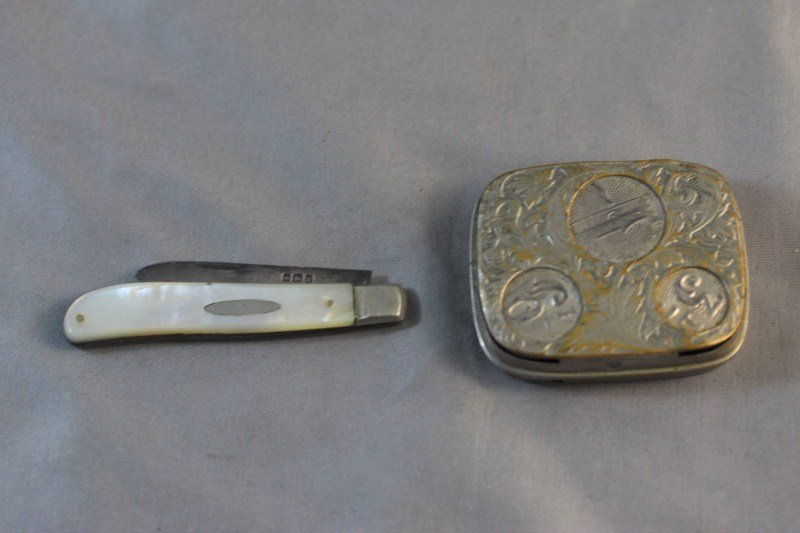 Mother of Pearl and Sterling Silver Pen Knife,: together with a silver plate sovereign holder, (2)