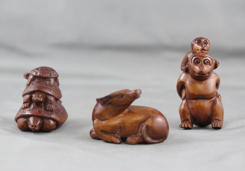 Three Carved Boxwood Netsuke,: (3)
