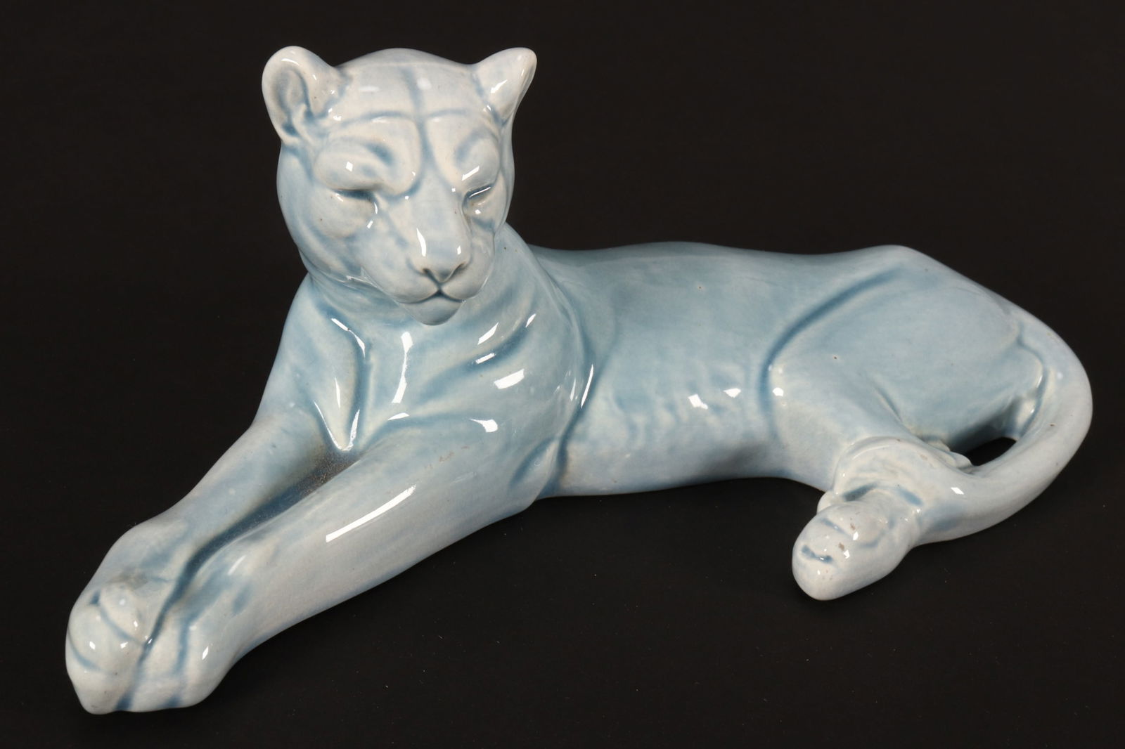 Rare Minton Pottery Figure of a Lioness,: c.1935, depicted recumbent, in a wonderful pale turquoise glaze, factory mark to base, height 7.5cm and length 20cm