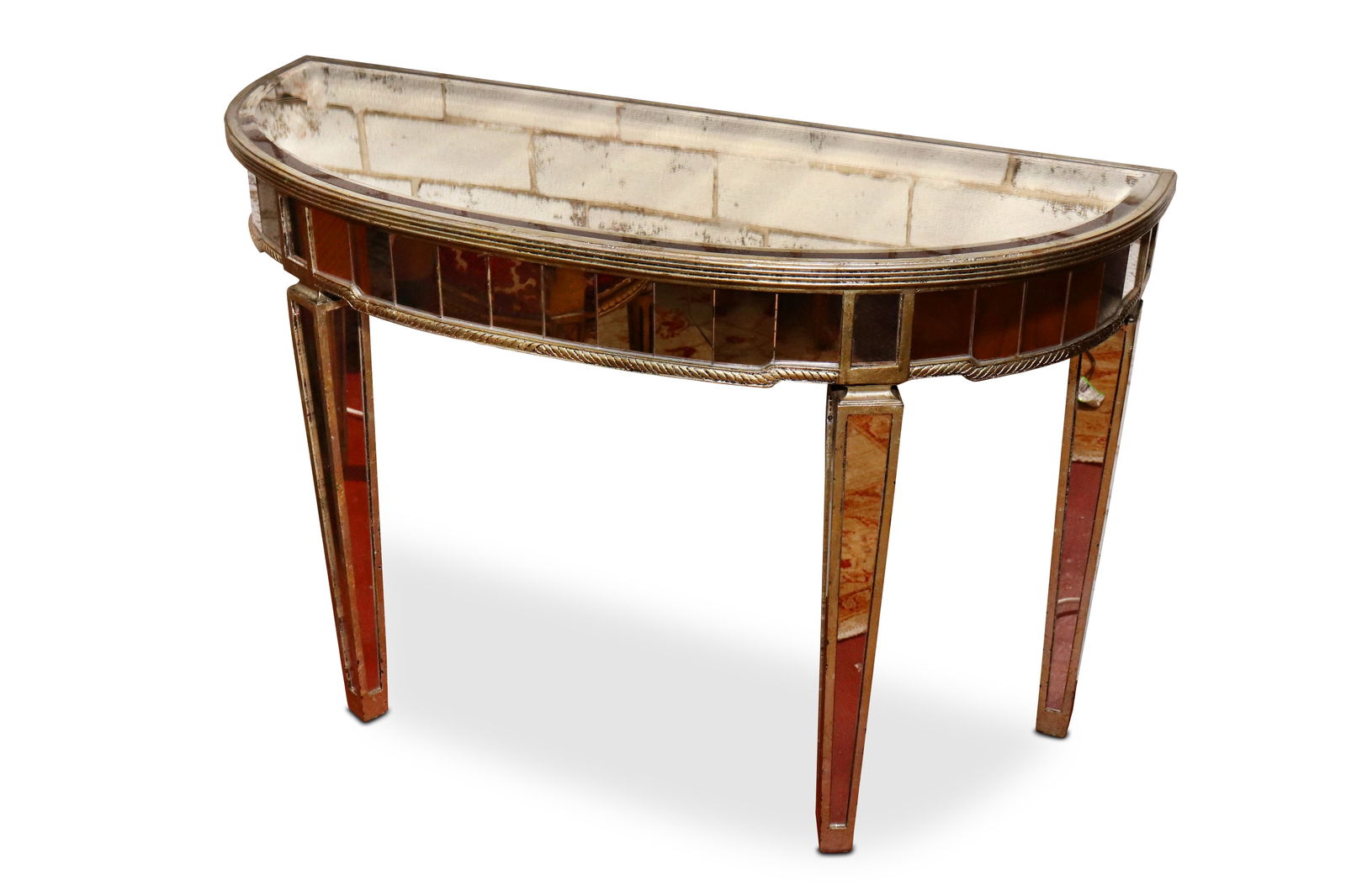 Contemporary Demi Lune Mirrored Console Table,: with bevelled mirrored top, accented with gilt roped and fluted borders, raised on four tapered fluted legs, 73cm x 106cm x 43cm