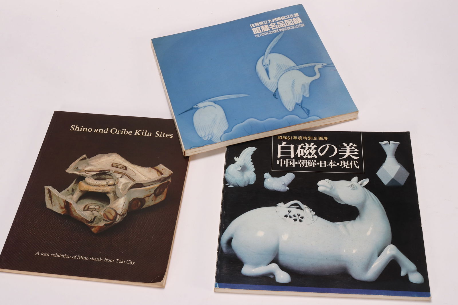 Three Books on Japanese Antiques,: comprising Shino and Oribe Kiln Sites by R F J Faulkner and O R Impey, The Kyushu Ceramic Museum Collection and one other (3)